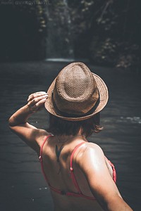 Woman at waterfall, background photo. Free public domain CC0 image.