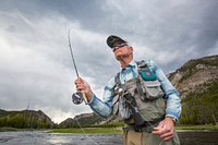 Fly fishing on the Madison River by Neal Herbert. Original public domain image from Flickr