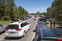 Crowded parking lot, Brink of Lower Falls by Neal Herbert. Original public domain image from Flickr