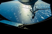 A U.S. Air Force B-1B Lancer assigned to the 9th Expeditionary Bomb Squadron approaches the boom pod of a KC-135 Stratotanker assigned to the 909th Aerial Refueling Squadron to receive fuel during Cope North 2017, Feb. 22, 2017.