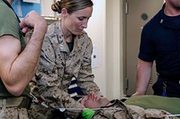 MEDITERRANEAN SEA (March 28, 2017) Lt. Erica Farren assigned to Combat Logistics Battalion (CLB) 24 assesses a simulated patient during a mass casualty exercise aboard amphibious transport dock ship, USS Mesa Verde (LPD 19), March 28, 2017.