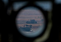 The view through a BGM-71 TOW 2B Aero missile holder during training at Joint Base McGuire-Dix-Lakehurst, N.J., March 23, 2017. The TOW (Tube-launched, Optically tracked, Wire-guided) is an American anti-tank missile. (U.S. Air National Guard photo by Master Sgt. Matt Hecht/Released). Original public domain image from Flickr