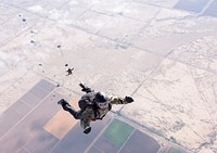 U.S. Sailors assigned to Explosive Ordnance Disposal Group (EODGRU) 1 and 2 deploy parachutes during military free-fall training in Eloy, Arizona, May 10, 2017.