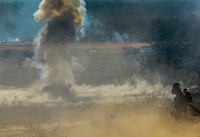 A BGM-71 TOW 2B Aero explodes hitting a tank target after being fired by a U.S. Army National Guard Soldier from the 50th Infantry Brigade Combat Team during training at Joint Base McGuire-Dix-Lakehurst, N.J., March 23, 2017. The TOW (Tube-launched, Optically tracked, Wire-guided) is an American anti-tank missile. (U.S. Air National Guard photo by Master Sgt. Matt Hecht/Released). Original public domain image from Flickr