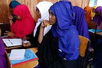 Iqra Ali( right from first row) attends ca class session at Hiran University in Beletweyne, Somalia on May 14, 2017. UN Photo. Original public domain image from Flickr