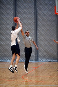 President Barack Obama plays basketball with Education Secretary Arne Duncan at the U.S. Department of Interior, Washington, D.C., Feb. 28, 2009.