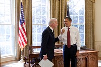 President Barack Obama and Vice President Joe Biden laugh together in the Oval Office, Jan. 22, 2009.