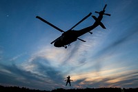 U.S. Air Force tactical control party airmen from the 227th Air Support Operations Squadron descend from a 1-150th Assault Helicopter Battalion UH-60 Black Hawk helicopter during joint training for New Jersey Task Force One at Joint Base McGuire-Dix-Lakehurst, N.J., June 28, 2017.