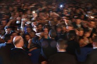 President Barack Obama and First Lady Michelle Obama greet supporters in the early morning hours at the Staff Ball at the D.C. Armory, Washington, Jan. 21, 2009.