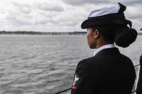 Kiel, Germany (June 16, 2017) - Logistics Specialist 2nd Class Jenessa Durant, from Johnsonville, South Carolina, mans the rails aboard the Arleigh Burke-class guided-missile destroyer USS James E. Williams (DDG 95) as the ship pulls into Kiel, Germany June 16, 2017.