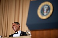 President Barack Obama reacts to a comment made at the White House Correspondents Awards Dinner in Washington, D.C. on Saturday, May 9, 2009.