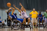 U.S. Army Sgt. 1st Class Earl Ohlinger, from Savannah, Ga., plays defense during a practice for the wheelchair basketball competition for the 2017 Department of Defense Warrior Games at Chicago, Ill., July 1, 2017.