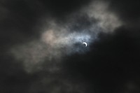 A partial eclipse can be seen in the sky above the New Jersey Air National Guard's 108th Wing, Joint Base McGuire-Dix-Lakehurst, N.J., Aug. 21, 2017.