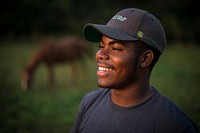 Living with his uncle in Runnels, Iowa, D’Quinton Robertson raises horses, chickens and a sheep.