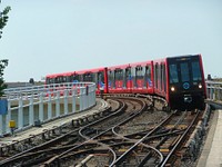 Moving train on a track. Free public domain CC0 photo.