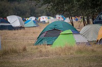 Wildland firefighter campsites at the Lolo Peak Incident Command Post, on August 24, 2017, near Missoula, MT. USDA Photo by Lance Cheung. Original public domain image from Flickr