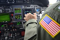 Lt. Christopher Capule, an Air Station Corpus Christi pilot, makes midair adjustments during a flight to San Angelo, Texas, Aug. 25, 2017.