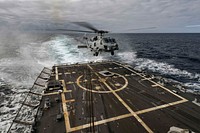 A U.S. Navy MH-60R Sea Hawk helicopter, assigned to Helicopter Maritime Strike Squadron (HSM) 46, Det. 1, lands on the flight deck of the Arleigh Burke-class guided-missile destroyer USS Oscar Austin (DDG 79) in the Atlantic Ocean Aug. 26, 2017.