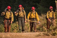 Firefighters with the Devil's Canyon Hand Crew, calls it a day after supervising tactical training with the Soldiers assigned to 23rd Brigade Engineer Battalion, 1-2 Stryker Brigade Combat Team, Umpqua North Complex, Oregon, September 8, 2017.