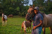 Living with his uncle in Runnels, Iowa, D’Quinton Robertson raises horses, chickens and a sheep.