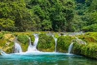 Small waterfall in China countryside. Free public domain CC0 image.