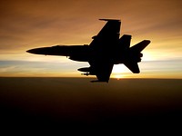 An F/A-18C Hornet aircraft returns from a mission over the Helmand River Valley of Afghanistan July 21, 2009.