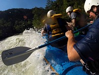 Patrons hit the rapids while whitewater rafting through the Ocoee River in the Cherokee National Forest, TN.USDA Photo by Lance Cheung. Original public domain image from Flickr