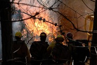 Firefighters from Vandenberg Air Force Base, Calif., and other area fire departments respond to a fire near Vandenberg Middle School on Vandenberg Air Force Base, Calif., Sept. 30, 2009.