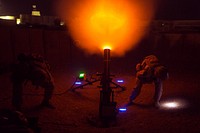 U.S. Marines with Task Force Southwest (TFSW) fire a 120mm mortar as a show of force at Camp Shorab, Afghanistan, March 10, 2018.