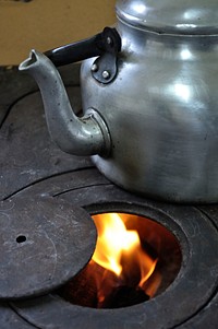 Boiling kettle with fire. Free public domain CC0 photo.