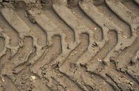 Tire track on the ground. Free public domain CC0 photo