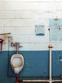 Urinals in bathroom at Oakland Airport. Free public domain CC0 image.