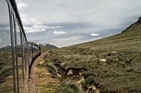 Moving train on a track. Free public domain CC0 photo.