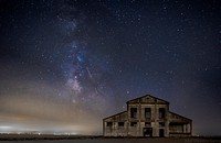 House under starry night sky. Free public domain CC0 photo.