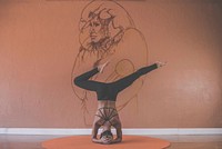 Free woman doing a yoga pose photo, public domain CC0 image.