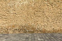 Stone pavement and stone wall. Free public domain CC0 photo.