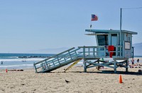 Lifeguard tower at beach. Free public domain CC0 photo.