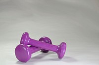 Closeup on purple gym dumbbell. Free public domain CC0 image.