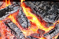 Burning firewood & coal background. Free public domain CC0 image.