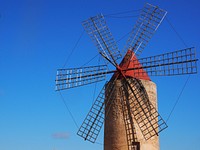 Traditional windmill in countryside. Free public domain CC0 image.