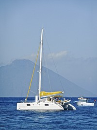 Yacht sailing in the sea. Free public domain CC0 photo.