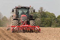 Valtra tractor and Guttler plow, Location unknown, May 18, 2016.