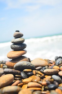 Pebble tower on the beach. Free public domain CC0 photo.