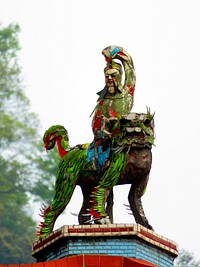 Chinese warrior and foo dog. Free public domain CC0 photo.