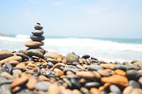 Pebble tower on the beach. Free public domain CC0 photo.