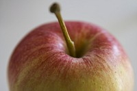 Closeup on red apple on white background. Free public domain CC0 photo.