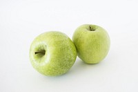 Closeup on green apples on white background. Free public domain CC0 photo.