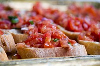 Closeup on Bruschetta with tomatoes. Free public domain CC0 image. 