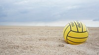 Closeup on volleyball in sand. Free public domain CC0 photo.