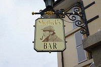 Sherlock's bar cafe sign. Free public domain CC0 photo.